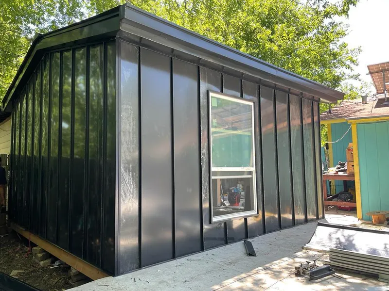 Black standing seam metal wall panels for Metal Roof Installation in Springdale